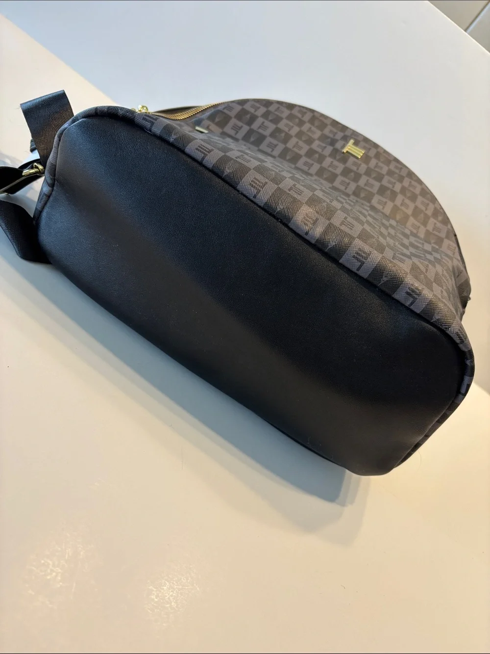 London Fog Women's Raven Tower Signature Print Backpack in Black